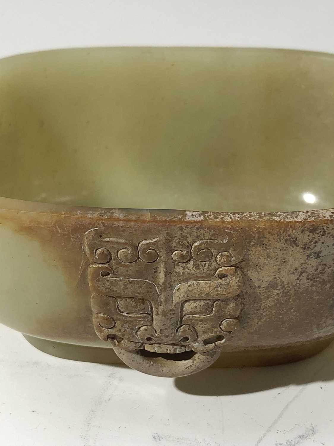 A Chinese jade water pot, 18th century, with twin horned beast handles, the front and rear with - Image 9 of 14