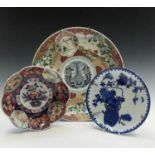 A Japanese imari charger, late 19th century, diameter 36.5cm, and two Japanese dishes, diameter 24.