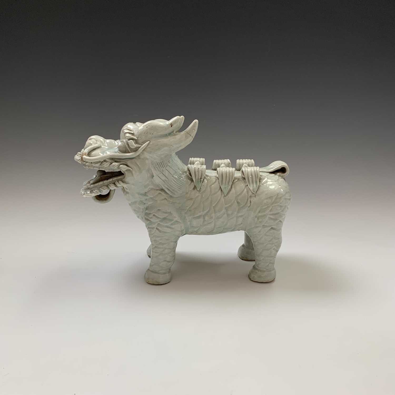 A Chinese celadon glazed pottery dog of fo, early 20th century, .height 23cm, length 28cm,width 11cm - Image 5 of 8