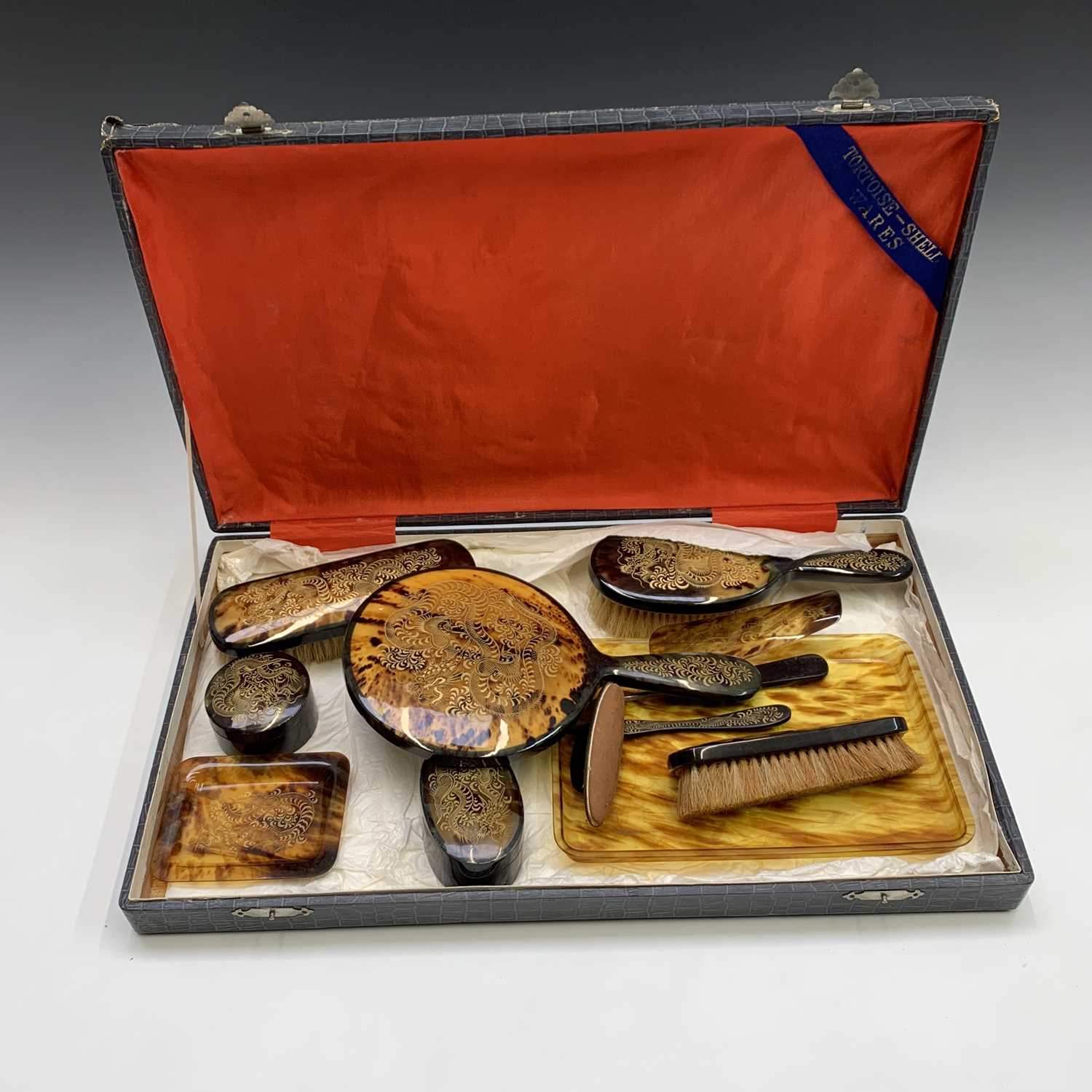 A Chinese faux tortoiseshell dressing table set, early 20th century, gilt decorated with stylised - Image 3 of 7