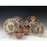 Three Japanese Imari chargers, 19th century, largest 31.5cm, a Japanese Imari dish, 24.5cm and two