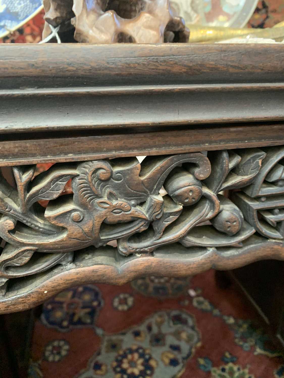 A Chinese hardwood twin pedestal desk, late 19th century, with bat and roundel carved stretchers, - Image 4 of 10