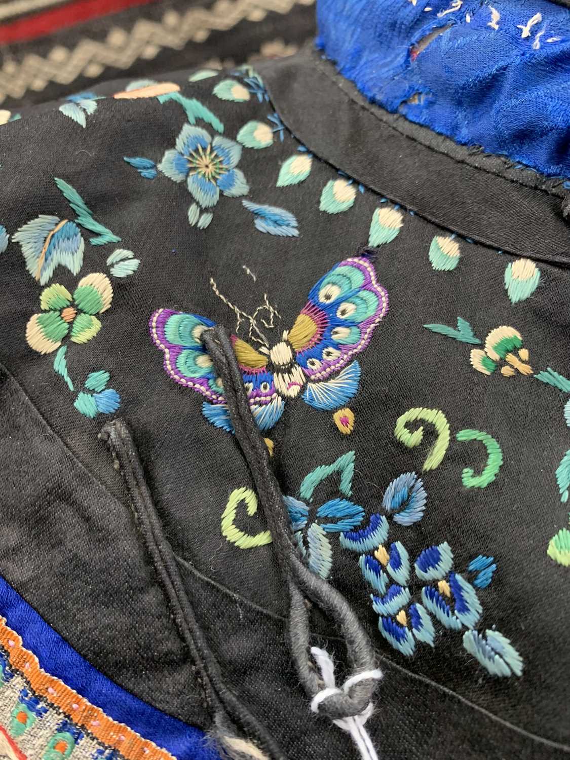 A Chinese silk embroidered jacket, Qing Period, with butterflies and floral decoration, length 74cm, - Image 2 of 4