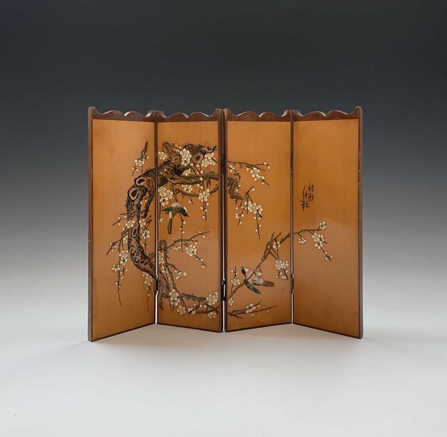 A Japanese bamboo four-fold table screen, early 20th century, signed, carved and painted with