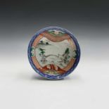 A Ming provincial pottery dish, diameter 25cm, a Japanese Imari dish and bowl and a Japanese