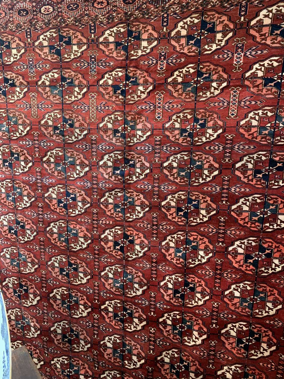 A Tekke carpet, Turkmenistan, circa 1890, the madder field with ten rows of five medallions, - Image 8 of 13