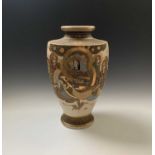 A large Japanese Satsuma pottery vase, late 19th century, with paper labels to underside,