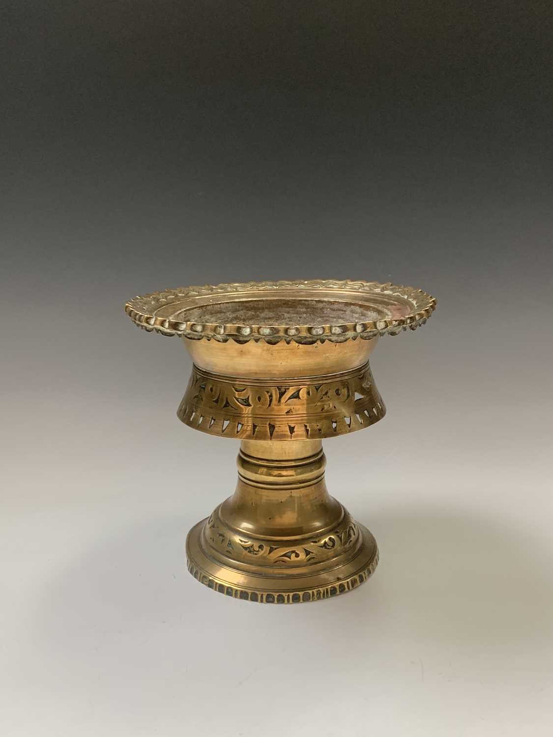 A Burmese circular pierced brass stand, 19th century, height 22.5cm, diameter 24.5cm and a bronze - Image 3 of 7