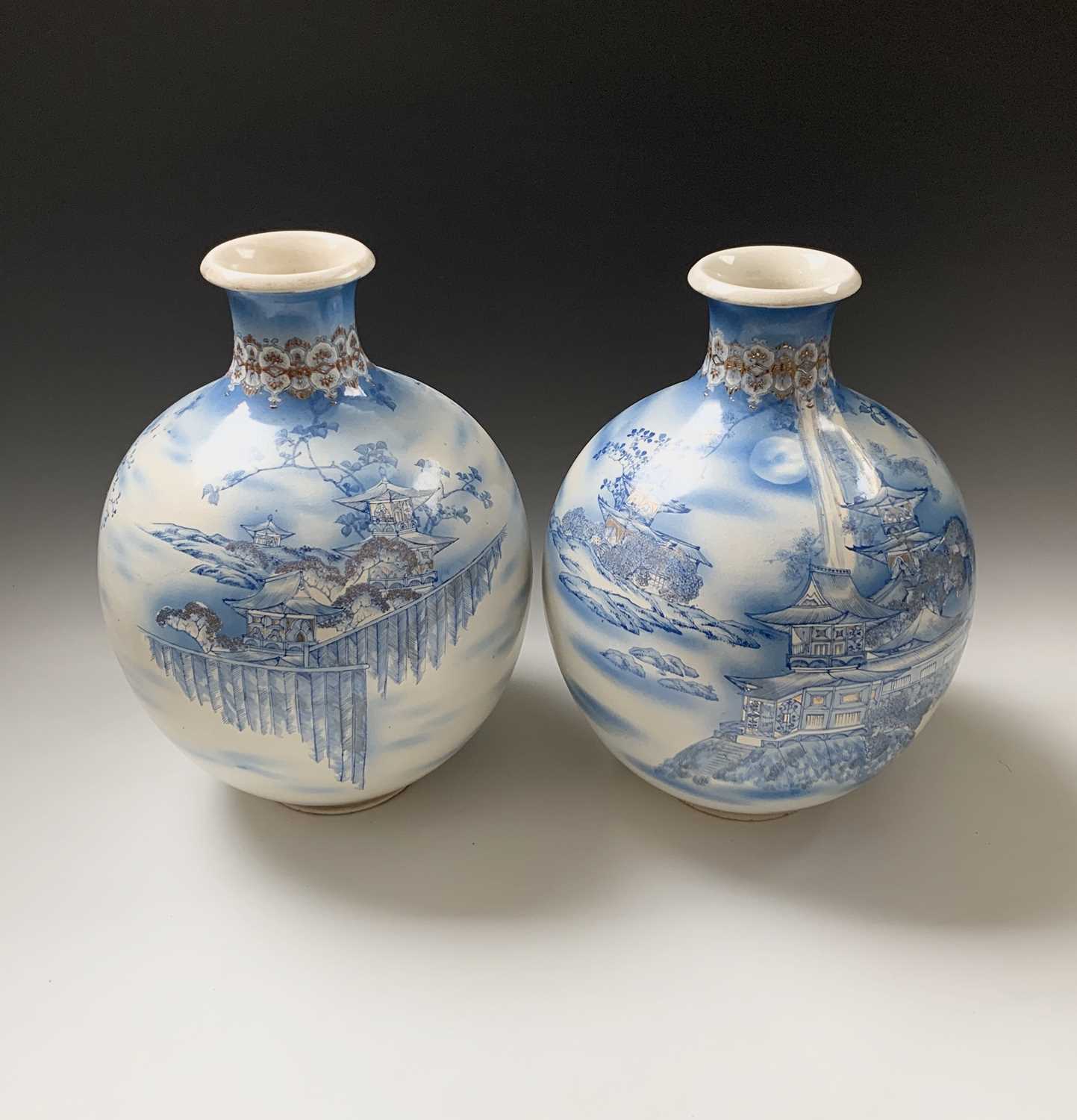 A large pair Japanese Satsuma earthenware vases, early 20th century, of globula form, signed, height