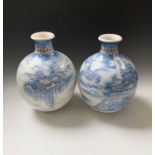 A large pair Japanese Satsuma earthenware vases, early 20th century, of globula form, signed, height