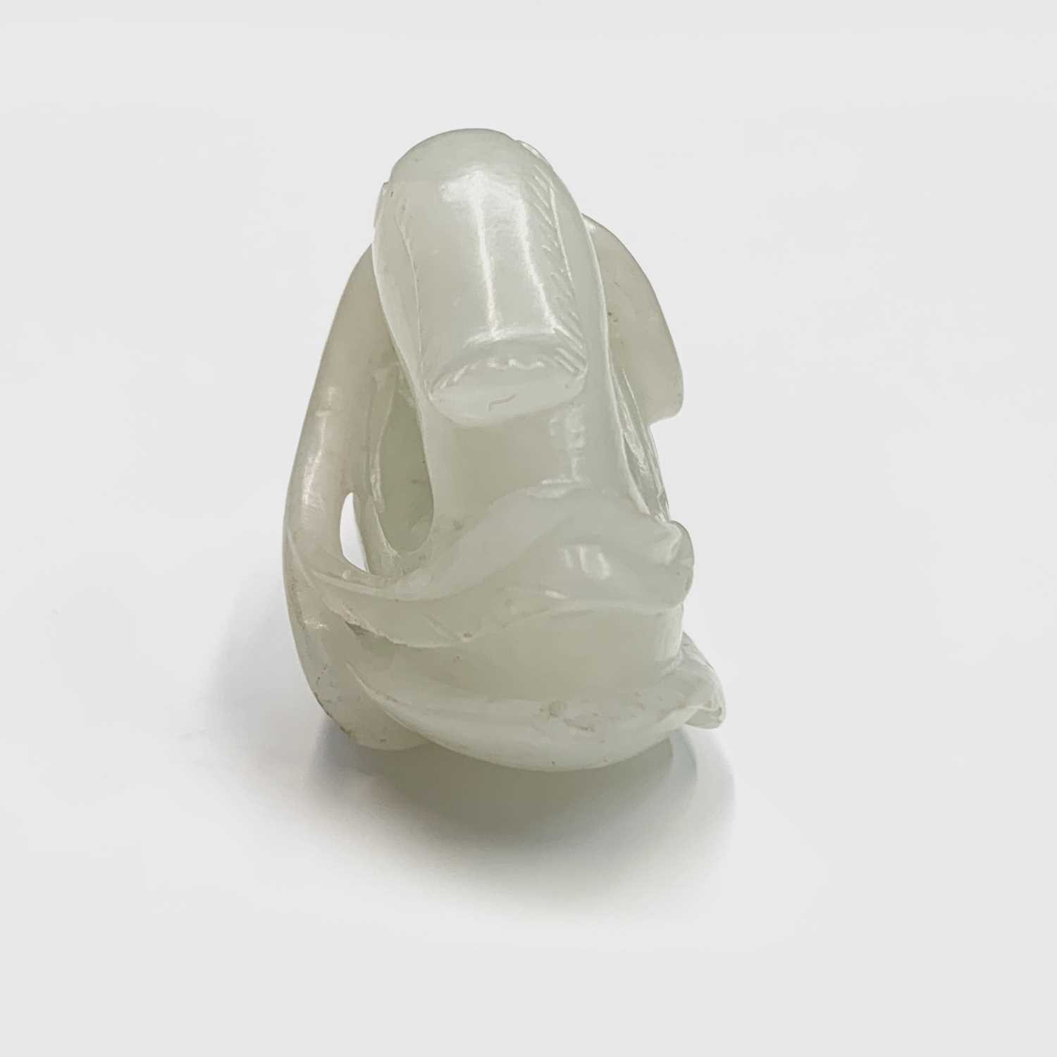 A small Chinese white jade carving of a duck, Qing dynasty, 19th century, height 3cm, width 4.5cm. - Image 10 of 11