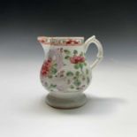 A Bow 'sparrow beak' cream jug, circa 1754, clip handle and decorated in famille rose enamels with