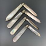 Four fruit knives, each with plain mother-of-pearl covers and plain folding silver blade