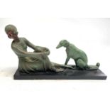 A French 1930s plaster group modeled as a seated lady beside a borzoi hound, overall length 61cm.
