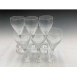 A set of six Cristalleries De Lorraine wine glasses. Height 21cm.