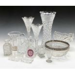 A collection of glassware comprising a pair cut glass vases, height 25cm, a tall vase, height 35.