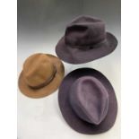 Three quality Gentlemen's fedora hats, one navy by Lock & Co, size 71/8, one dark blue by Christy'