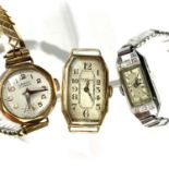 A ladies gold rectangular watch by Benson, one other ladies gold watch and a cocktail watch.