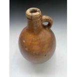 A German Stoneware jar. Height 40.5cm.