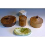 Three treen boxes, tallest 8cm high, an onyx pin dish and a marble cube paperweight (5).