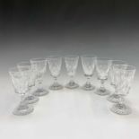 A set of six wine glasses, their bowls engraved with fruiting vine decoration, height 15.5cm,