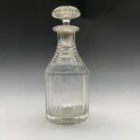 A good 19th century cut glass decanter and stopper, with engraved initials and crested a lion