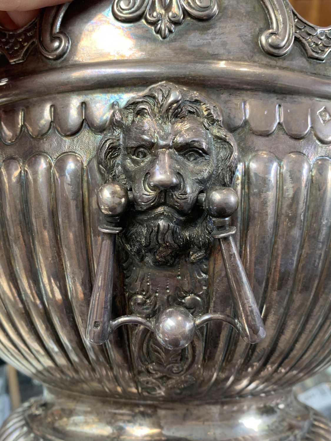 An impressive Scottish retailed silver montieth punch bowl with lions head handles, fluting and a - Image 6 of 8