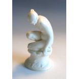 A Royal Doulton figure of a crouching female nude, printed marks and impressed numbers to base.