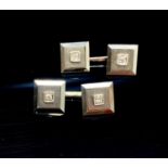 A pair of 18ct white gold diamond set dress cuff-links