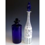 A Victorian decanter with acid etched leafy vine decoration and blue glass stopper, together with