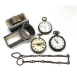 A Georgian silver pocket watch, two other silver pocket watches and two silver napkin rings