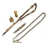 A Victorian propelling penknife/pencil, a propelling dip pen on a watch chain set with "Goldstone"