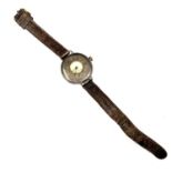 A silver half-hunter cased trench wristwatch with Swiss 15 jewel, 3 Adjustments movement. The back