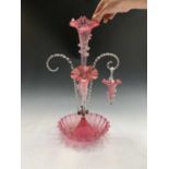 A Victorian cranberry glass epergne (incomplete). Height 52.5cm.