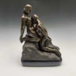 A bronze sculpture of two lovers, on polished slate base. Height 34.5cm.