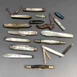 A late Victorian "ladies shoe" pocket knife by Williams Sheffield with marbled plastic covers, a