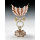 A good Venetian latticino glass, the navette shape bowl on elaborate stem and circular foot.