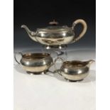 A silver three-piece oval tea service by Adie Brothers Ltd Birmingham 1932 21oz