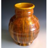 A West German type pottery vase, indistinct printed mark to base. Height 27cm.