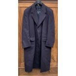 A top quality gentleman's single breasted navy overcoat in pure new wool, by Crombie. Length