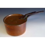 A Victorian copper pan with cover, both stamped 'Stocken Hall'. Overall height 15cm.