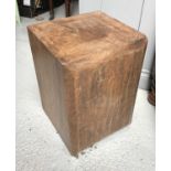 A square chunk of chestnut timber. Height 44cm, width 31cm, depth 30cm.