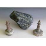 Two carved serpentine models of lighthouses on naturalistic bases, both approx. 10cm, together