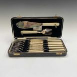A cased set of silver plated fish knives, forks and servers, retailed by Bowden & Sons, Plymouth,