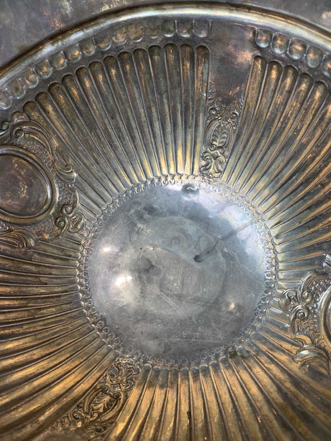 An impressive Scottish retailed silver montieth punch bowl with lions head handles, fluting and a - Image 5 of 8