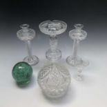 A Victorian green glass dump with internal bubble decoration, diameter 11cm, together with a pair of