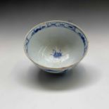 A rare Bow blue and white bowl, circa 1750, decorated with a landscape, underglaze mark and labels