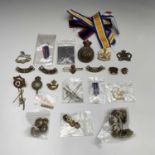 CAP BADGES, MILITARY BUTTONS ETC. Lot includes: A 5th Dragoons Guards Kings Crown badge and Canadian