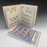 Stamps: Mint Great Britain stamps comprising a large stock book, a 2002 World cup smilers sheet
