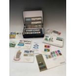 G.B. STAMPS: A blue box containing First Day Covers, Presentation Packs and other stamps -